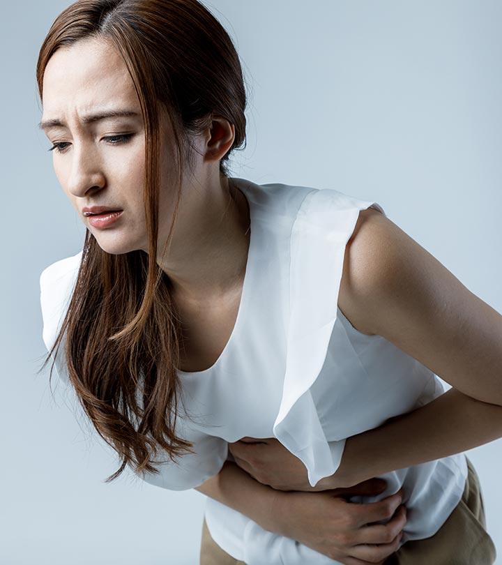 Women Suffering From Stomach Ulcer
