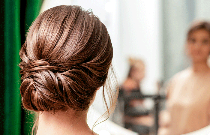 Elevate Your Look With Chic Hairstyling Ideas : Messy Knot High Bun