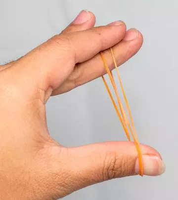 Wrap A Rubber Band Around Your Fingers To Keep The Pain And Stiffness Away