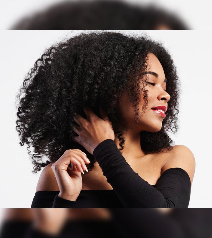 Woman Taking Care Of Natural Hair To Maintain Locks