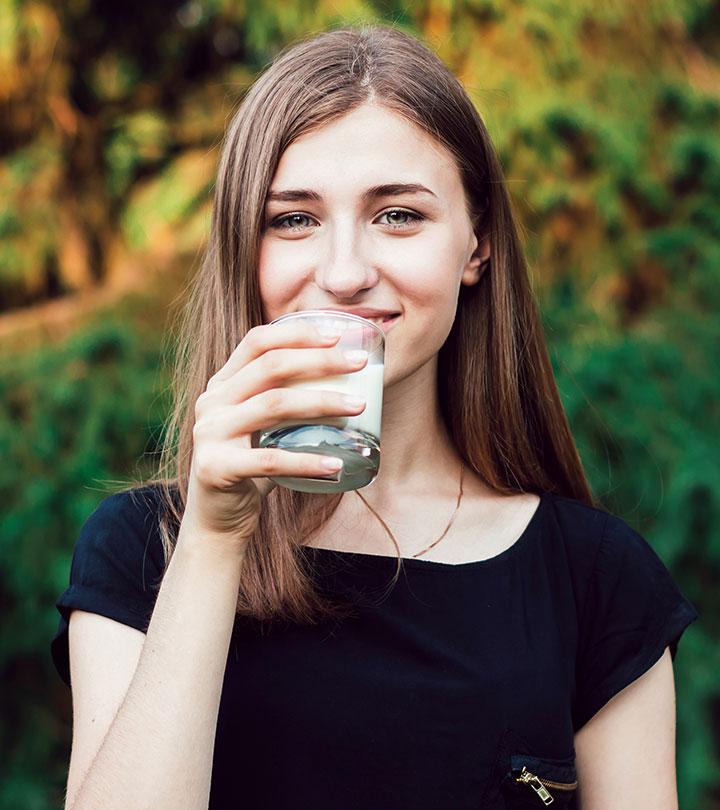 A girl drinking collagen drinks