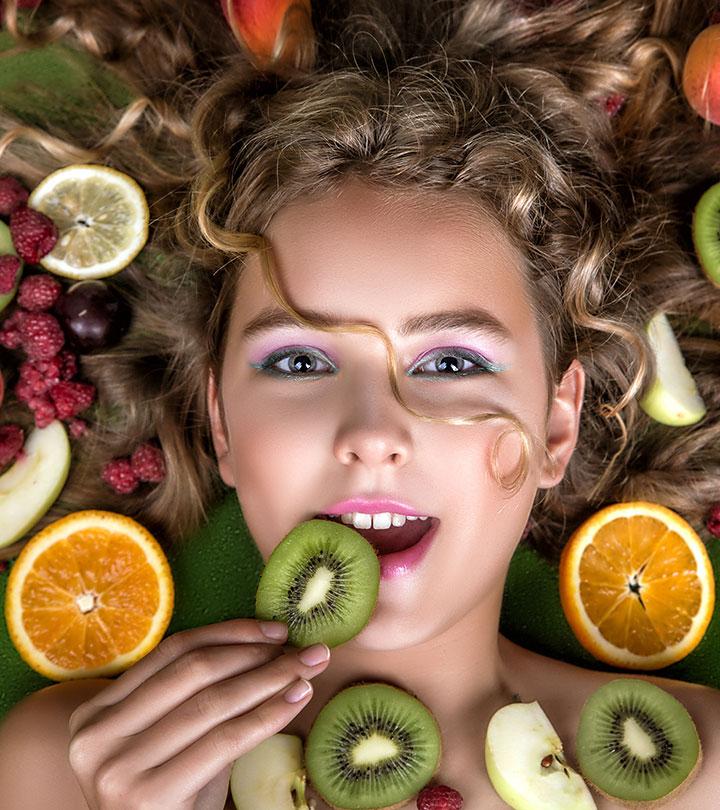 A girl with lots of fruit slices