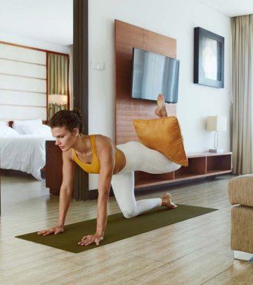 A girl doing a donkey kick exercise