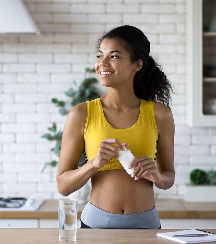 Women Taking Vitamins For Her Weight Loss