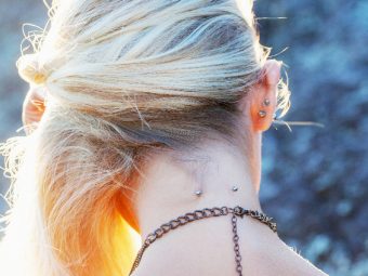 A woman with a nape piercing