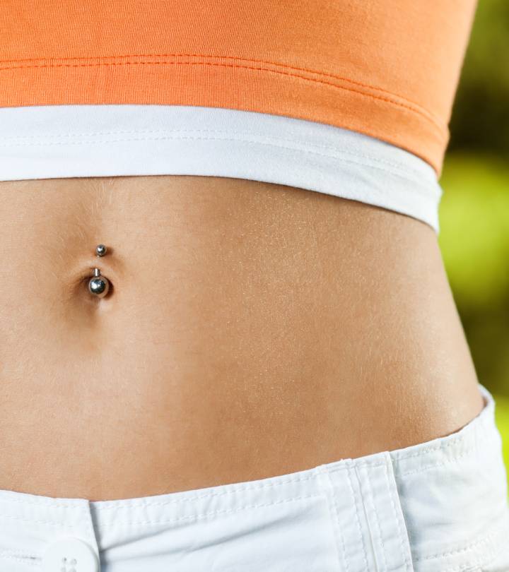 A woman with a belly button piercing