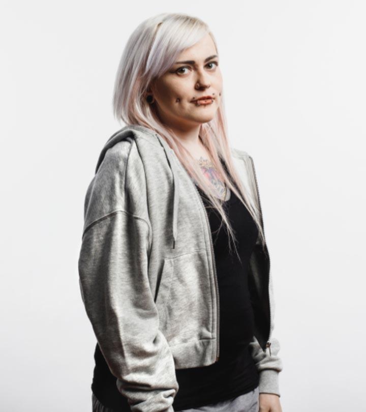 A woman with a cheek piercing