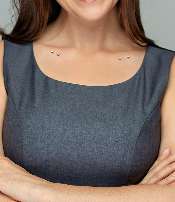 woman with a collarbone piercing