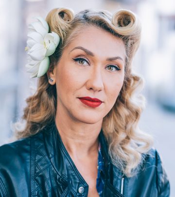 A woman sporting victory rolls