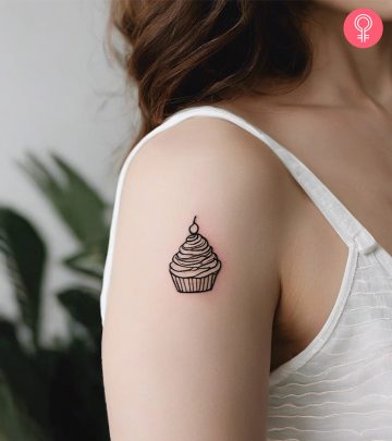 A woman sporting a cake tattoo