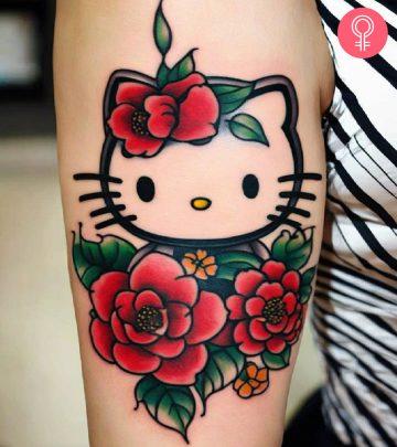 Woman with a Hello Kitty tattoo on her arm Woman with a Hello Kitty tattoo on her arm