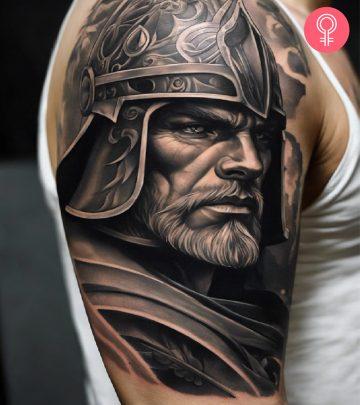 A man with a warrior tattoo on his arm A man with a warrior tattoo on his arm