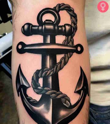 An anchor and rope tattoo on the arm
