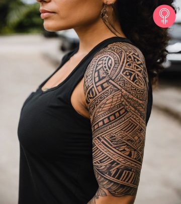 A woman with a Tongan tattoo on her upper arm