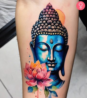 Buddha and lotus tattoo on the forearm of a woman