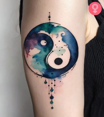 A woman with a yin yang tattoo.