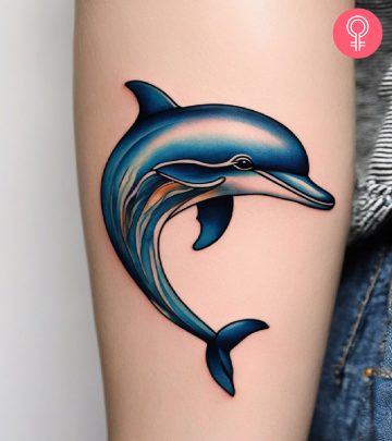 Dolphin tattoo on the forearm