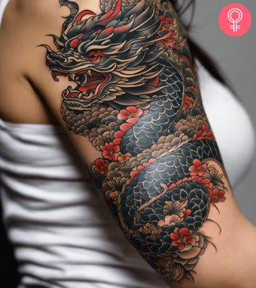 Japanese dragon tattoo on the arm of a woman