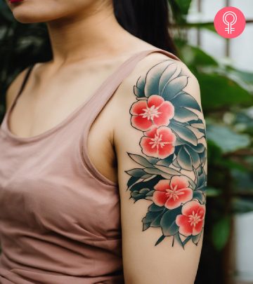 A woman with a Tebori tattoo design on the upper arm. Stable Diffusion/StyleCraze Design Team