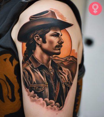 Cowboy tattoo on the upper arm Cowboy tattoo on the upper arm