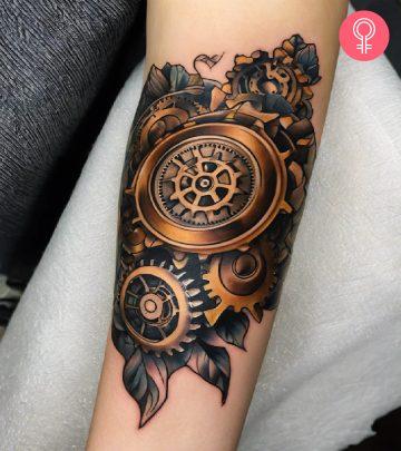 Steampunk tattoo on the arm of a woman Steampunk tattoo on the arm of a woman