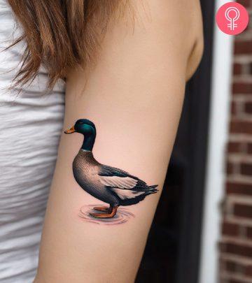 Woman with duck tattoo on her arm Woman with duck tattoo on her arm
