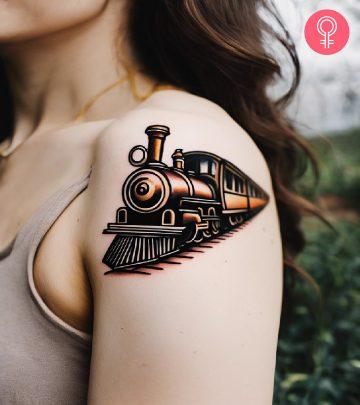 A traditional train tattoo on the upper arm A traditional train tattoo on the upper arm