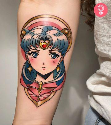 A woman sporting an anime tattoo on her forearm A woman sporting an anime tattoo on her forearm