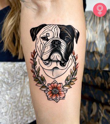 Illustrative bulldog tattoo on the forearm
