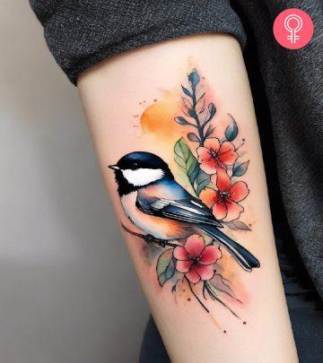 Chickadee tattoo on the arm Chickadee tattoo on the arm