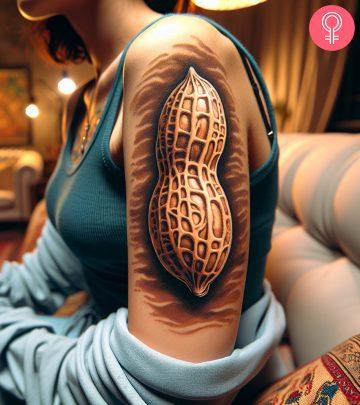 Peanut tattoo on the upper arm Peanut tattoo on the upper arm