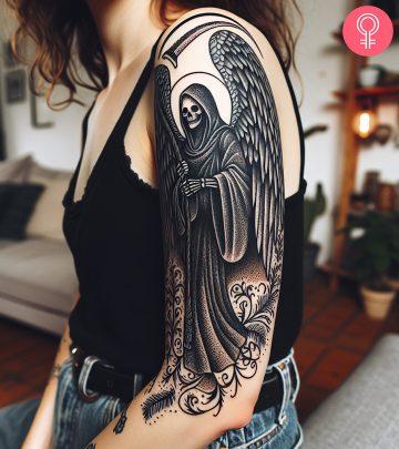 An angel of death tattoo on the upper arm An angel of death tattoo on the upper arm