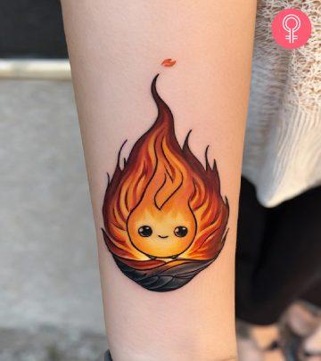 A cute and blaring Calcifer tattoo on the forearm A cute and blaring Calcifer tattoo on the forearm