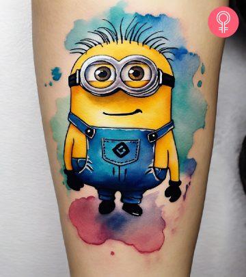 A minion tattoo on the forearm of a woman A minion tattoo on the forearm of a woman