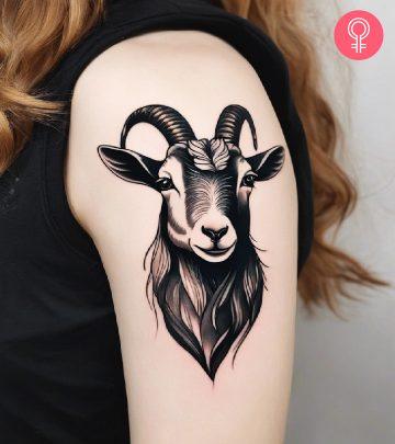 Goat tattoo on the upper arm Goat tattoo on the upper arm