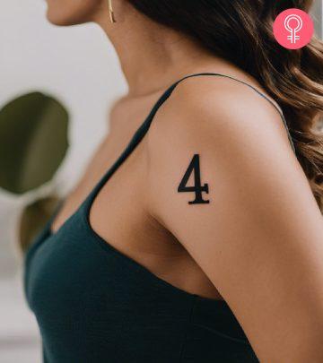 Number 4 tattoo on the shoulder of a woman Number 4 tattoo on the shoulder of a woman
