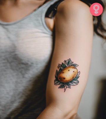 Potato tattoo on the arm of a woman Potato tattoo on the arm of a woman