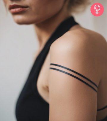 Two-line tattoo on the arm of a woman Two-line tattoo on the arm of a woman