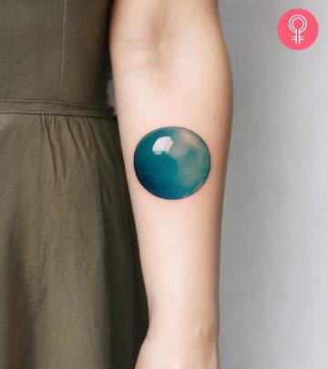 Woman with bubble tattoo on her arm Woman with bubble tattoo on her arm